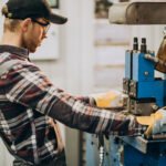 Man working on steel fatory and equipment for steel production